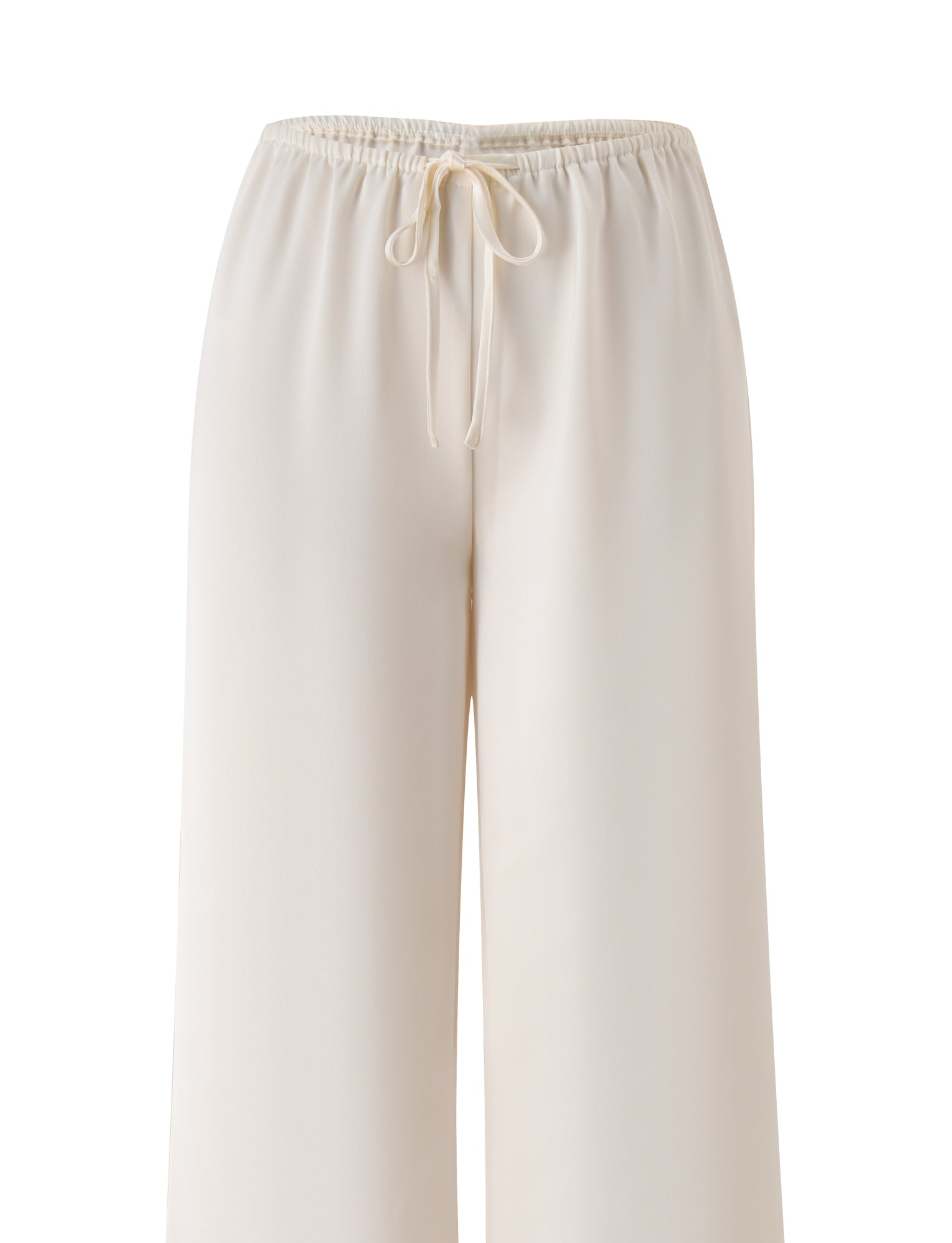 The MAURA PANT - WHITE by TIGERMIST showcases a cream-colored, wide-leg silhouette with an adjustable elastic waistband and drawstring for a comfortable fit, displayed against a white background.