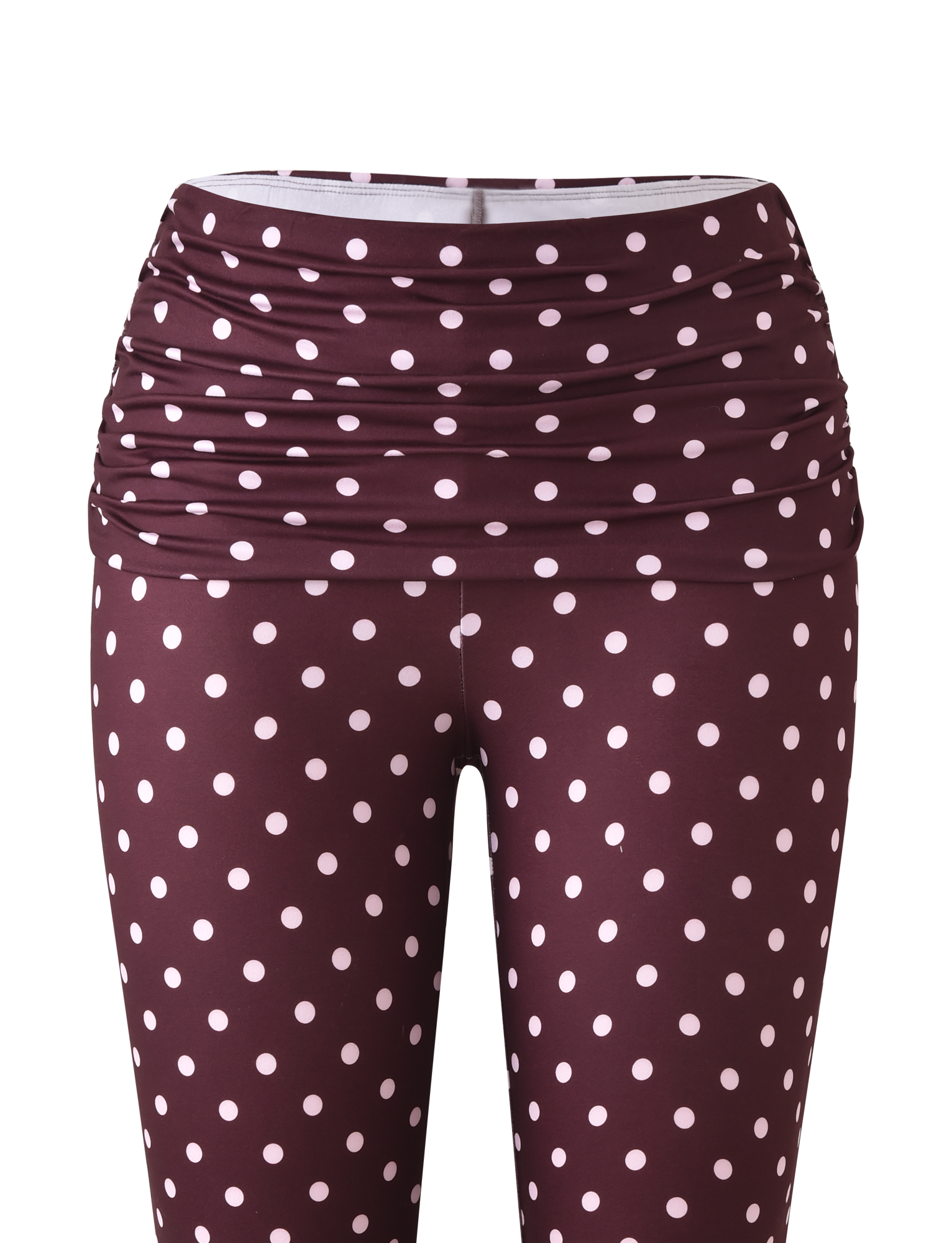 Front view of TIGERMIST's VALI POLKA DOT CAPRI - CHOCOLATE PINK DOT, high-waisted capri leggings with a foldover waistband and chocolate background with pink polka dots.