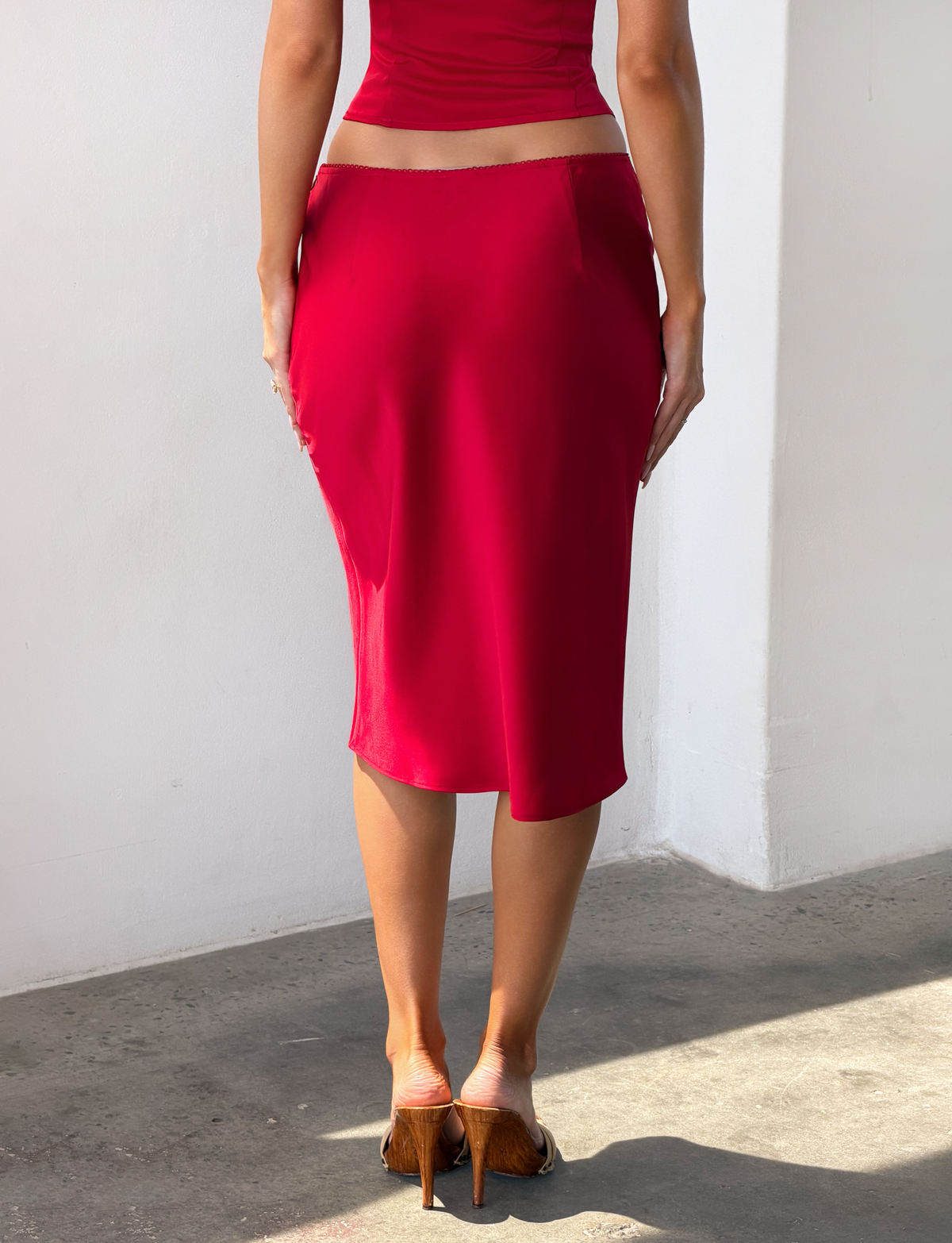 Tiger Mist Maura Midi Skirt in cherry red satin, on-model photo 10