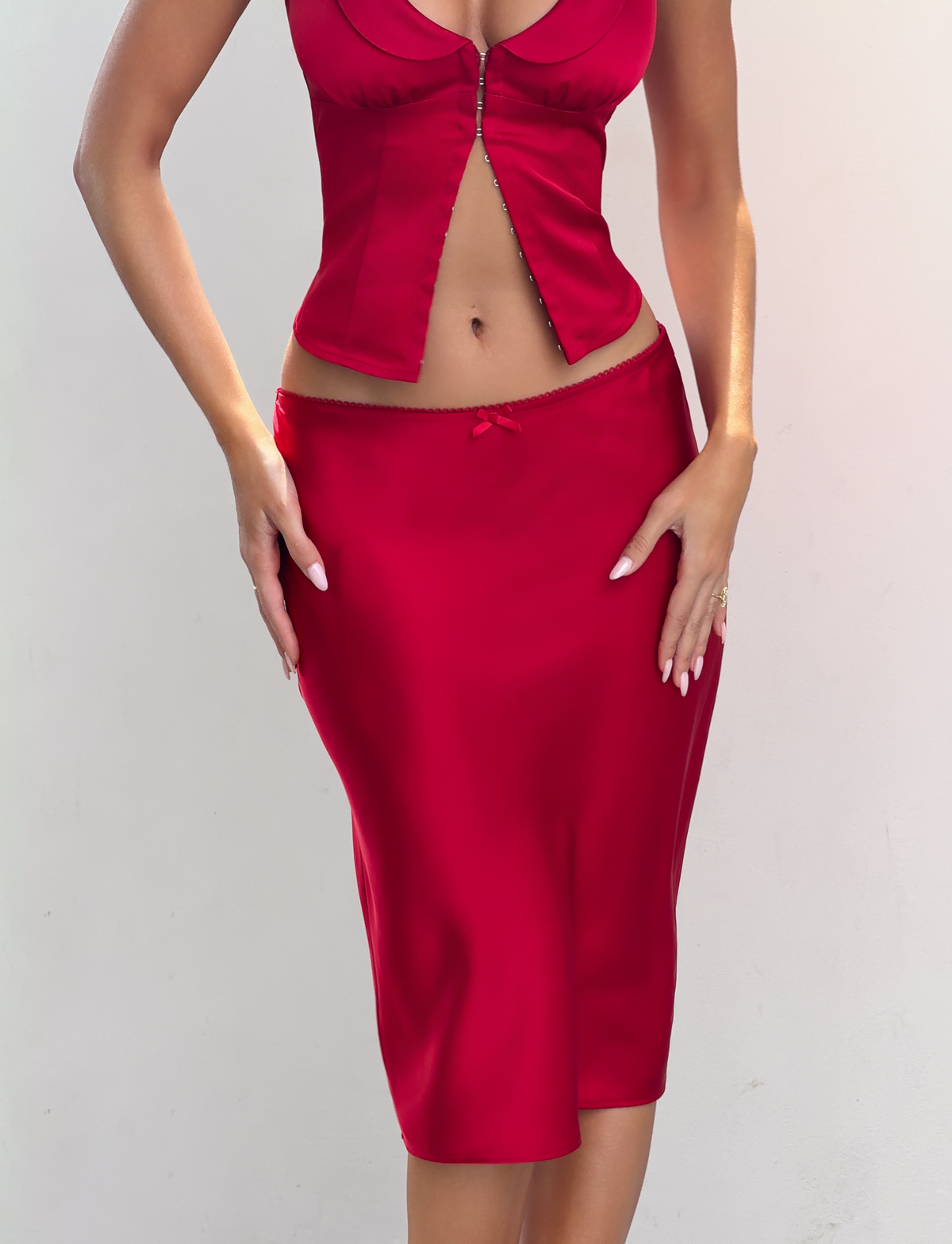 Tiger Mist Maura Midi Skirt in cherry red satin, on-model photo 3