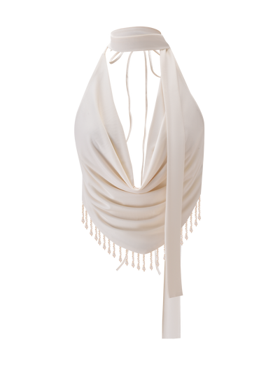 The TIGERMIST AUBRIELLA TASSLE TOP in cream features a backless halter design with a draped cowl neckline, long neck sash ties, and beaded tassel trim at the hem for a chic touch.