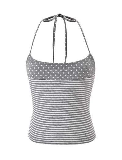 The DASHIELL TOP by TIGERMIST is a heather grey rib knit halter with adjustable neck ties, featuring white polka dots above contrast stripes.