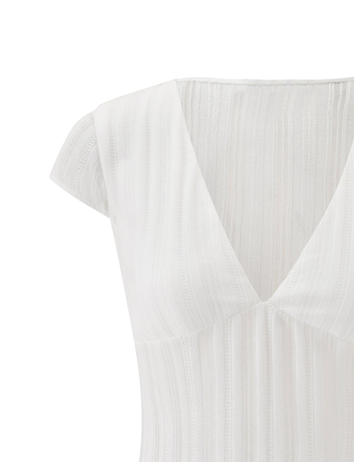 Close-up of the TIGERMIST LONA TOP in white, featuring a textured V neck design with short sleeves and subtle vertical stripes. Crafted from a lightweight, semi-sheer material, this blouse offers delicate elegance.