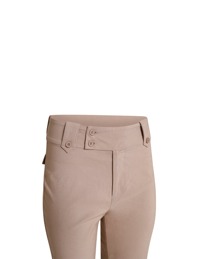 A pair of the beige KITTIE HIGH RISE PANT - TAN from TIGERMIST is shown from the waist down. The pants feature a double-button waistband with belt loops and a flat front design. The image is set against a white background.