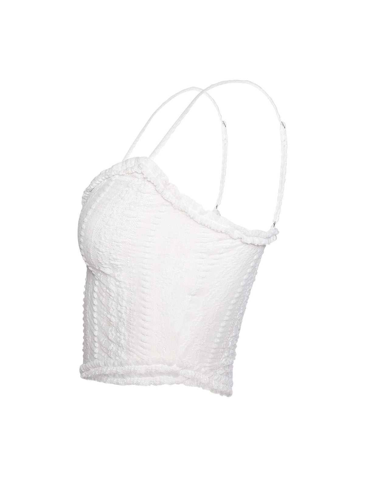 A side view of the SOPHA TWO PIECE TOP - WHITE by TIGERMIST reveals a textured, sleeveless crop top with thin spaghetti straps, featuring slight ruffle detailing along the neckline and hem.