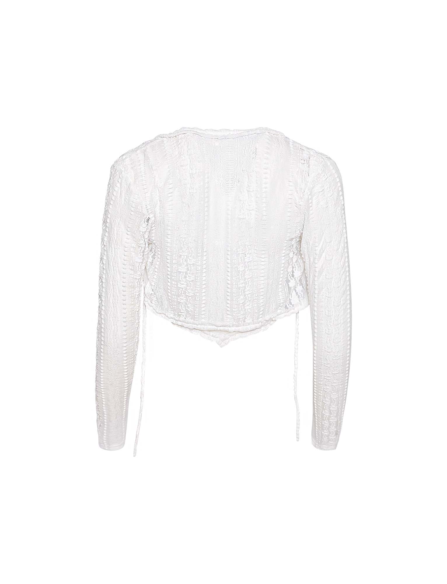 The SOPHA TWO PIECE TOP - WHITE by TIGERMIST is showcased against a plain background. This white, long-sleeve, semi-sheer lace top boasts intricate patterns and a round neckline, extending slightly past the waist. It exudes a delicate and elegant vibe, making it perfect for formal or special occasions.